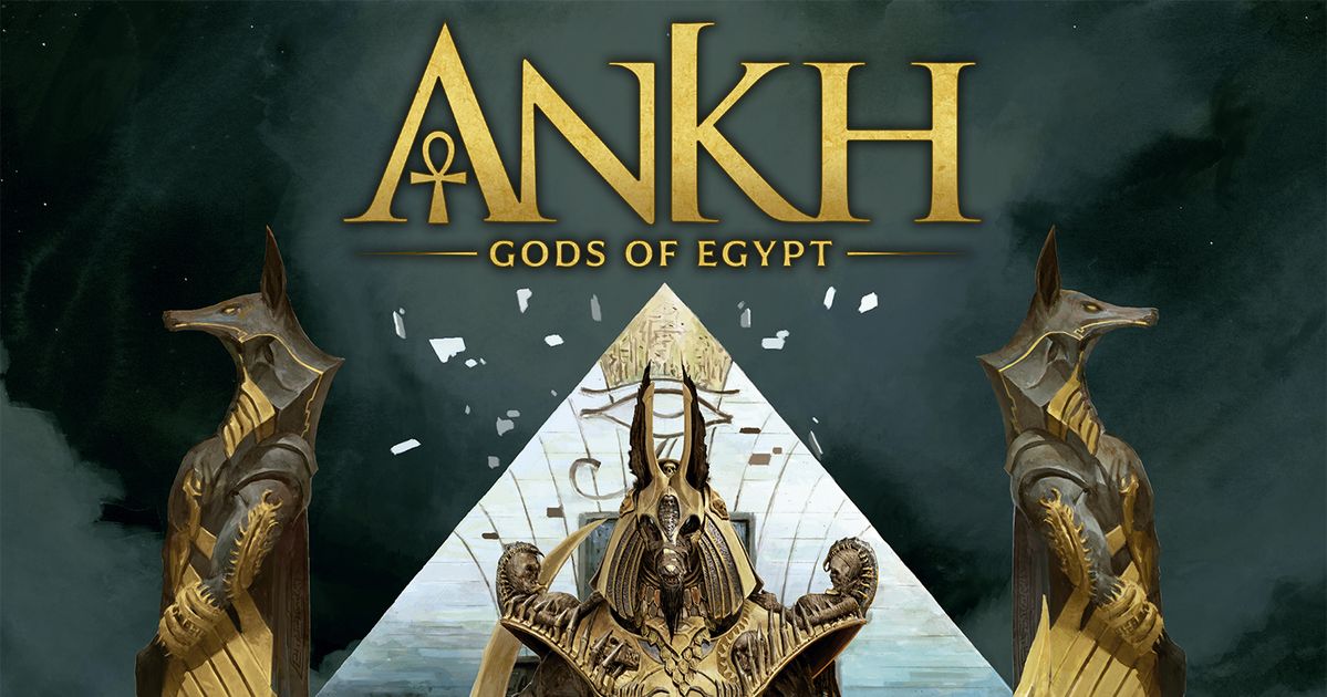 Ankh: Gods of Egypt box art, a gold Anubis statue framing a pyramid entrance under a dark sky